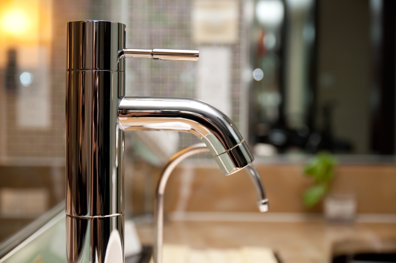 Leaking tap being repaired in Islington